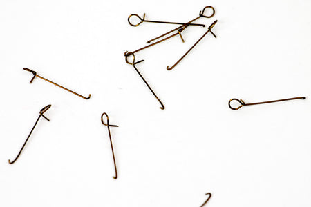 Du tilføjede <b><u>Druckknöpfe für den Haken</u></b> til kurven.